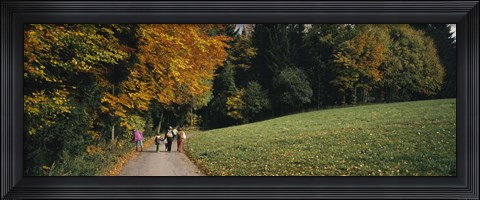 Framed Group of people walking on a walkway in a park, St. Peter, Black Forest, Baden-Wurttemberg, Germany Print