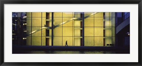 Framed Silhouette of a person walking in front of a building, Paul Lobe Haus, Berlin, Germany Print