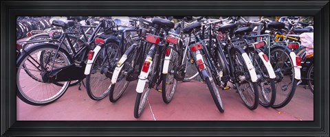 Framed Bicycles parked in a parking lot, Amsterdam, Netherlands Print