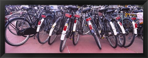 Framed Bicycles parked in a parking lot, Amsterdam, Netherlands Print