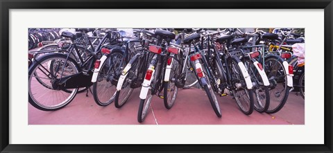 Framed Bicycles parked in a parking lot, Amsterdam, Netherlands Print