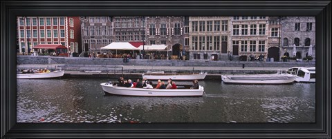 Framed High angle view of tourboats in a river, Leie River, Graslei, Ghent, Belgium Print
