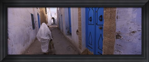 Framed Rear view of a woman walking on the street, Medina, Kairwan, Tunisia Print
