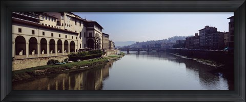 Framed Buildings along a river, Uffizi Museum, Ponte Vecchio, Arno River, Florence, Tuscany, Italy Print