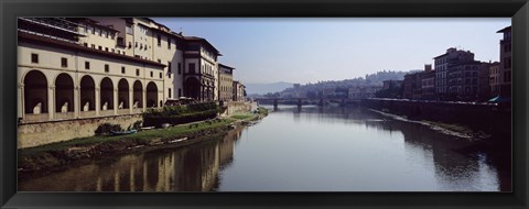 Framed Buildings along a river, Uffizi Museum, Ponte Vecchio, Arno River, Florence, Tuscany, Italy Print