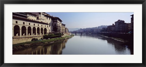 Framed Buildings along a river, Uffizi Museum, Ponte Vecchio, Arno River, Florence, Tuscany, Italy Print