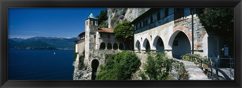 Framed Walkway along a building at a lake, Santa Caterina del Sasso, Lake Maggiore, Piedmont, Italy Print