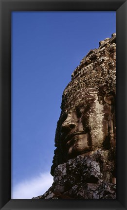 Framed Low angle view of a face carving, Angkor Wat, Cambodia Print