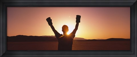 Framed Silhouette of a person wearing boxing gloves in a desert at dusk, Black Rock Desert, Nevada, USA Print