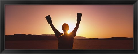 Framed Silhouette of a person wearing boxing gloves in a desert at dusk, Black Rock Desert, Nevada, USA Print
