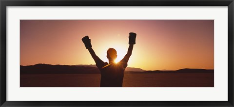 Framed Silhouette of a person wearing boxing gloves in a desert at dusk, Black Rock Desert, Nevada, USA Print