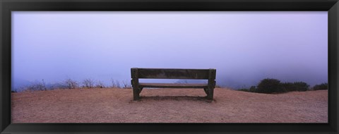 Framed Empty bench in a parking lot, California, USA Print