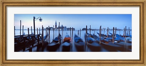 Framed Row of gondolas moored near a jetty, Venice, Italy Print