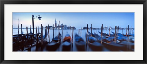 Framed Row of gondolas moored near a jetty, Venice, Italy Print