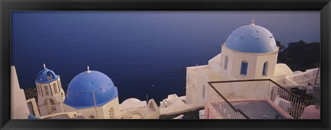 Framed High angle view of blue domed church at the coast, Oia, Santorini, Greece Print