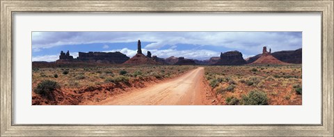 Framed Dirt road through desert landscape with sandstone formations, Utah. Print