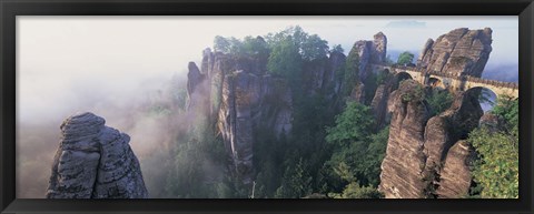 Framed Bridge passing through cliffs, Bastei Bridge, Saxon Switzerland National Park, Dresden, Saxony, Germany Print