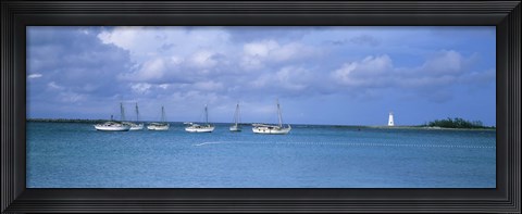 Framed Boats in the sea with a lighthouse in the background, Nassau Harbour Lighthouse, Nassau, Bahamas Print