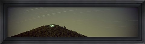 Framed Low angle view of star trails over a mountain peak, Echo Mountain, Piediluco Lake, Terni, Umbria, Italy Print