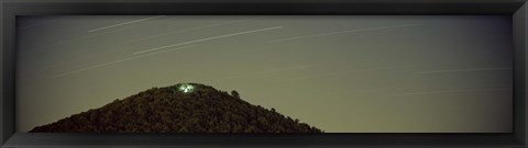 Framed Low angle view of star trails over a mountain peak, Echo Mountain, Piediluco Lake, Terni, Umbria, Italy Print