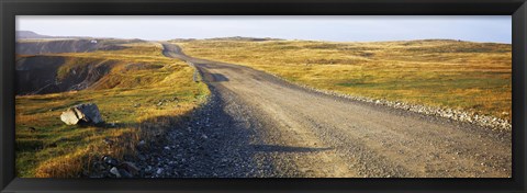 Framed Gravel road passing through a landscape, Cape Bonavista, Newfoundland, Newfoundland and Labrador, Canada Print