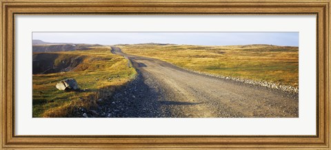 Framed Gravel road passing through a landscape, Cape Bonavista, Newfoundland, Newfoundland and Labrador, Canada Print