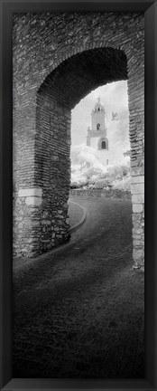 Framed Church viewed through an archway, Puerta Del Sol, Medina Sidonia, Cadiz, Andalusia, Spain Print