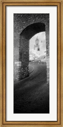 Framed Church viewed through an archway, Puerta Del Sol, Medina Sidonia, Cadiz, Andalusia, Spain Print