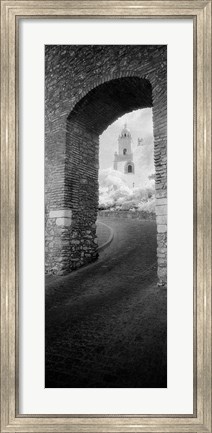 Framed Church viewed through an archway, Puerta Del Sol, Medina Sidonia, Cadiz, Andalusia, Spain Print