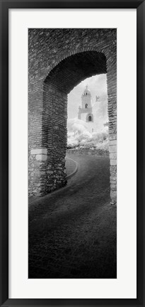 Framed Church viewed through an archway, Puerta Del Sol, Medina Sidonia, Cadiz, Andalusia, Spain Print