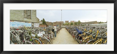 Framed Bicycles parked in the parking lot of a railway station, Gent-Sint-Pieters, Ghent, East Flanders, Flemish Region, Belgium Print