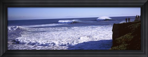 Framed Tourist looking at waves in the sea, Santa Cruz, Santa Cruz County, California, USA Print