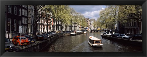 Framed Close up of Boats in a canal, Amsterdam, Netherlands Print