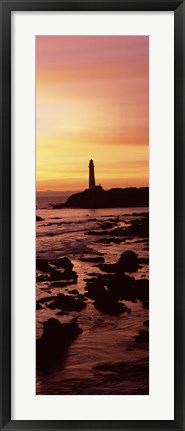 Framed Silhouette of a lighthouse at sunset, Pigeon Point Lighthouse, San Mateo County, California Print