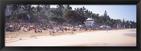 Framed Tourists on the beach, North Shore, Oahu, Hawaii, USA Print