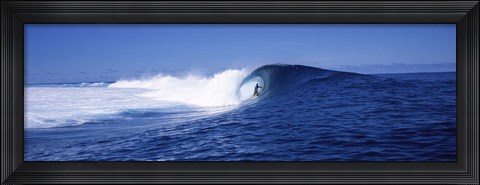 Framed Surfer in the sea, Tahiti, French Polynesia Print