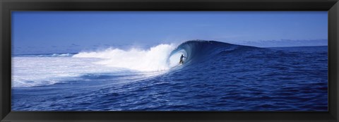 Framed Surfer in the sea, Tahiti, French Polynesia Print