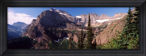 Framed Trees with a mountain range in the background, US Glacier National Park, Montana, USA Print