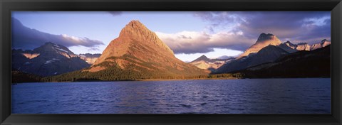 Framed Sunlight falling on mountains at the lakeside, Swiftcurrent Lake, Many Glacier, US Glacier National Park, Montana, USA Print