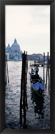 Framed Gondolier in a gondola with a cathedral in the background, Santa Maria Della Salute, Venice, Veneto, Italy Print