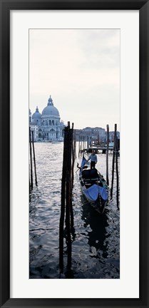 Framed Gondolier in a gondola with a cathedral in the background, Santa Maria Della Salute, Venice, Veneto, Italy Print