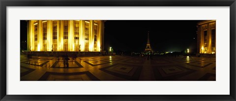 Framed Buildings lit up at night with a tower in the background, Eiffel Tower, Paris, France Print