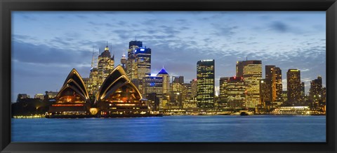 Framed Opera house and buildings lit up at dusk, Sydney Opera House, Sydney Harbor, Sydney, New South Wales, Australia Print