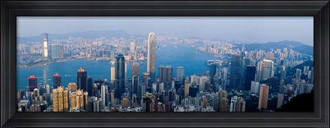 Framed Skyscrapers in a city, Victoria Harbour, Hong Kong, China Print