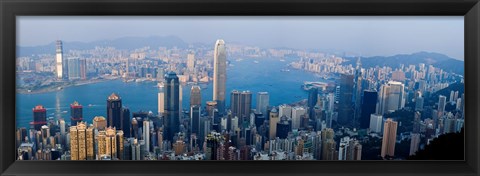 Framed Skyscrapers in a city, Victoria Harbour, Hong Kong, China Print