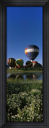 Framed Reflection of hot air balloons in a lake, Hot Air Balloon Rodeo, Steamboat Springs, Colorado, USA Print