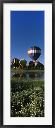 Framed Reflection of hot air balloons in a lake, Hot Air Balloon Rodeo, Steamboat Springs, Colorado, USA Print