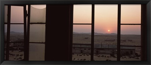 Framed Sunrise viewed through a window, Sperrgebiet, Kolmanskop, Namib Desert, Namibia Print