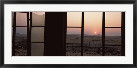 Framed Sunrise viewed through a window, Sperrgebiet, Kolmanskop, Namib Desert, Namibia Print