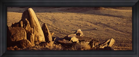 Framed Rocks in a desert, overview of tourist vehicle, Namibia Print